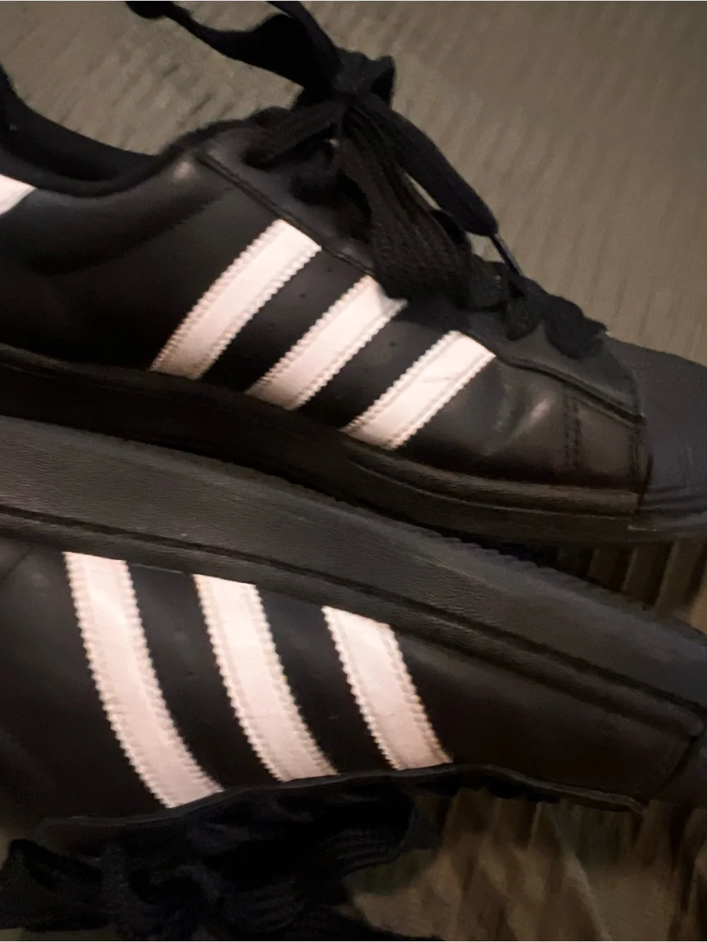 adidas men’s Superstar Sneakers - Black with White Stripes
